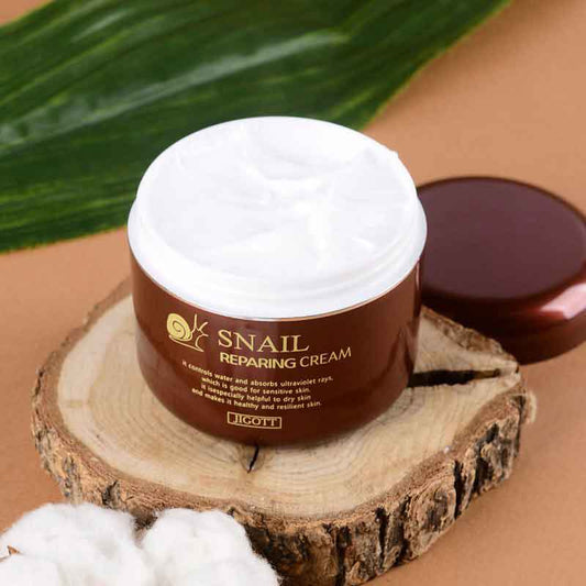 Jigott Snail Repairing Cream - Sraigių ekstraktu pagrįstas atstatantis veido kremas
